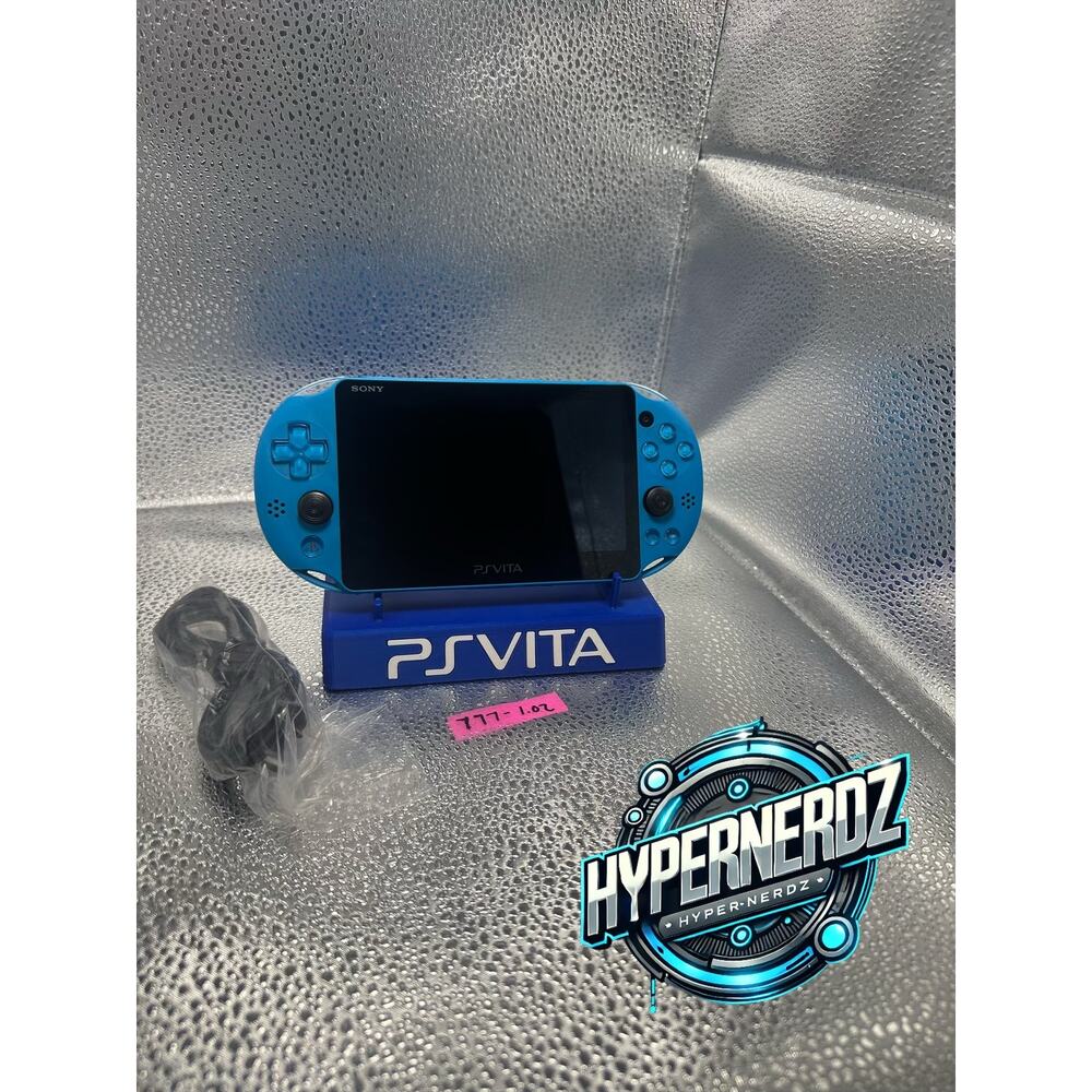 Blue ps vita 2000 w/ usb charger, no drift, new sticks!